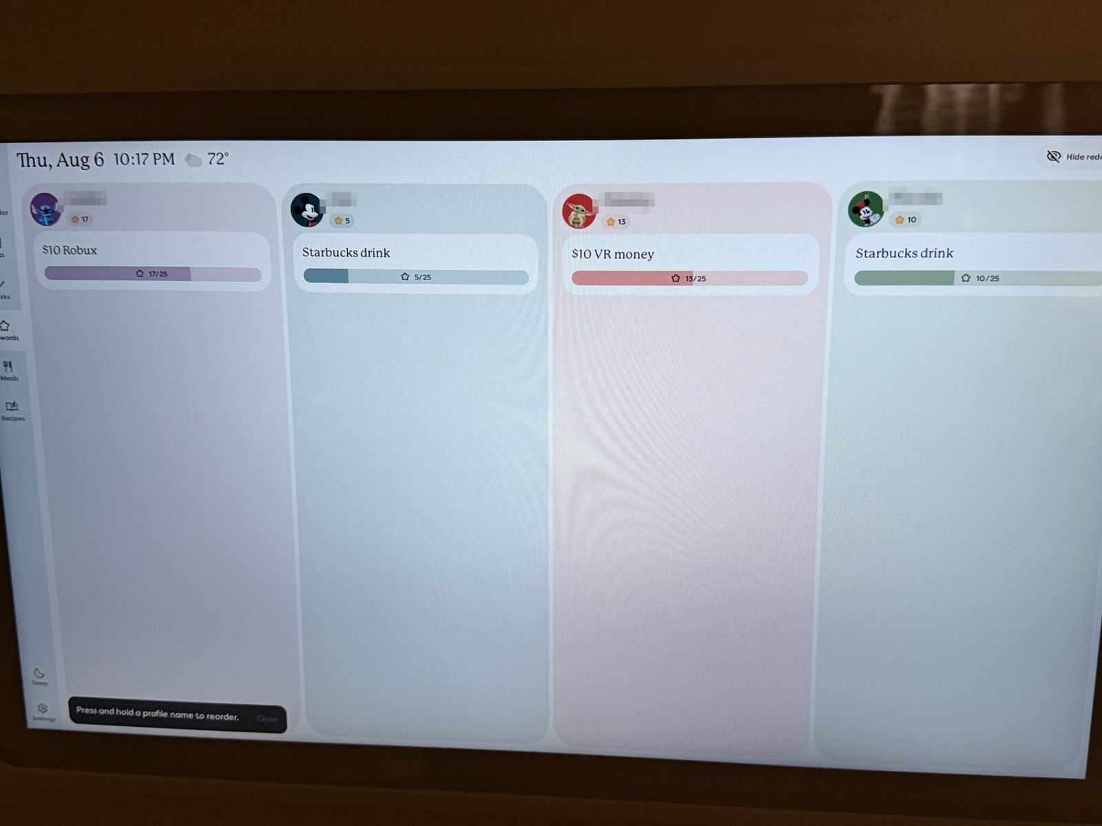 Skylight Calendar rewards screen showing each family member's chosen reward and star progress